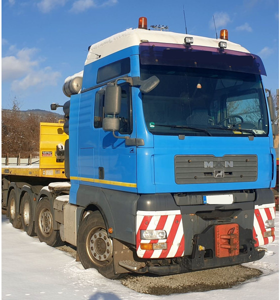 MAN 8x4 hydr. 250t TGA 41.680 BBS (8V) - Nyergesvontató: 2 kép. MAN 8x4 hydr. 250t TGA 41.680 BBS (8V) - Nyergesvontató: 2 kép.