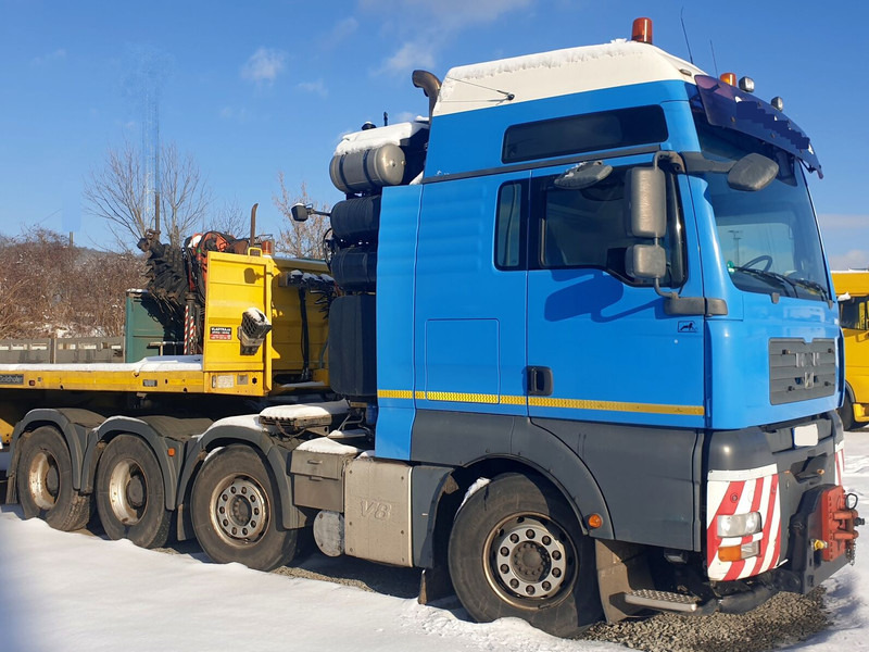 MAN 8x4 hydr. 250t TGA 41.680 BBS (8V) - Nyergesvontató: 3 kép. MAN 8x4 hydr. 250t TGA 41.680 BBS (8V) - Nyergesvontató: 3 kép.