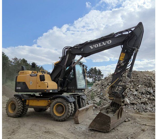 Volvo EW 140D (17t) - Gumikerekes kotró: 1 kép. Volvo EW 140D (17t) - Gumikerekes kotró: 1 kép.