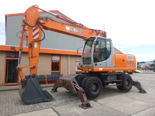 FIAT-KOBELCO E215W - Gumikerekes kotró: 2 kép. FIAT-KOBELCO E215W - Gumikerekes kotró: 2 kép.