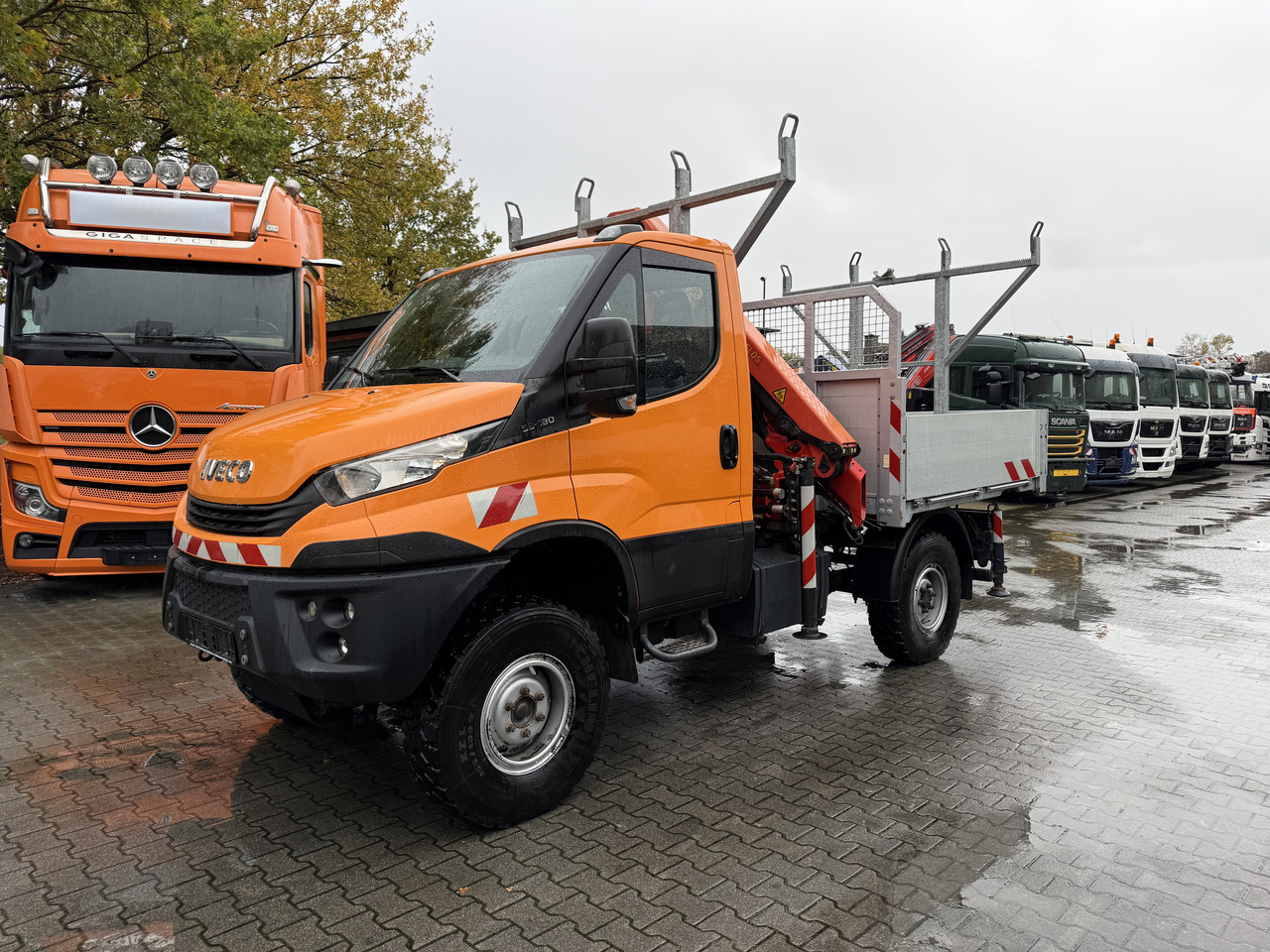 Iveco Daily 55S18W 4X4 Palfinger PK 7.501 - Platós kisteherautó: 1 kép. Iveco Daily 55S18W 4X4 Palfinger PK 7.501 - Platós kisteherautó: 1 kép.