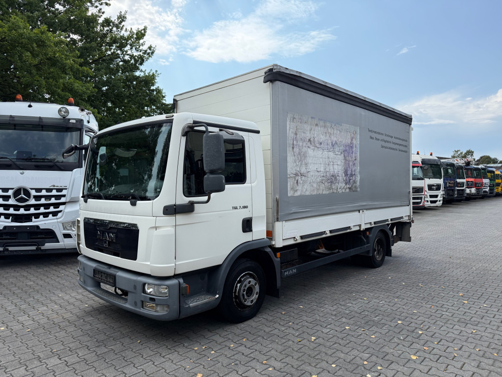 MAN TGL 7.180 4X2 BL 1500Kg Ladebordwand - Ponyvás teherautó: 1 kép. MAN TGL 7.180 4X2 BL 1500Kg Ladebordwand - Ponyvás teherautó: 1 kép.