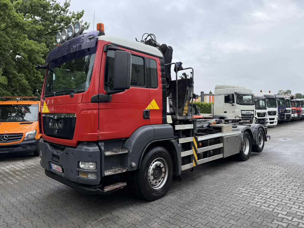 MAN TGS 26.360 6X2 Haken mit Kran HMF 1643Z - Horgos rakodó teherautó, Darus autó: 1 kép. MAN TGS 26.360 6X2 Haken mit Kran HMF 1643Z - Horgos rakodó teherautó, Darus autó: 1 kép.