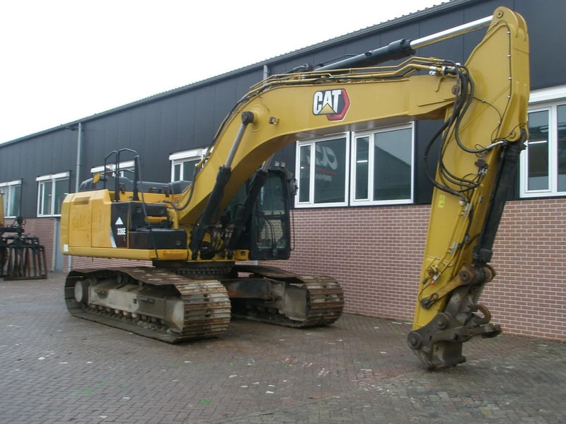 Caterpillar 336E - Lánctalpas kotró: 4 kép. Caterpillar 336E - Lánctalpas kotró: 4 kép.