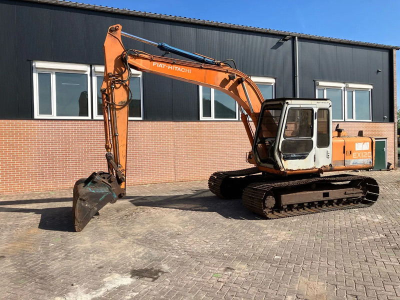 Fiat Hitachi EX120 - Lánctalpas kotró: 1 kép. Fiat Hitachi EX120 - Lánctalpas kotró: 1 kép.