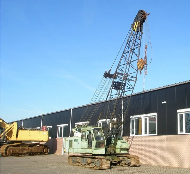 Hitachi KH125-3 - Lánctalpas daru: 4 kép. Hitachi KH125-3 - Lánctalpas daru: 4 kép.