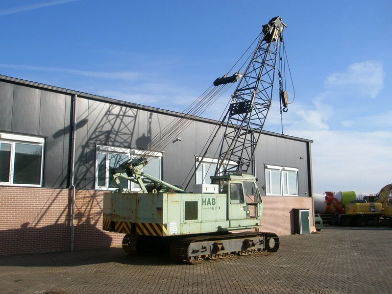 Hitachi KH125-3 - Lánctalpas daru: 3 kép. Hitachi KH125-3 - Lánctalpas daru: 3 kép.