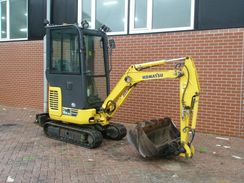 Komatsu PC16R-3HS - Minikotró: 4 kép. Komatsu PC16R-3HS - Minikotró: 4 kép.