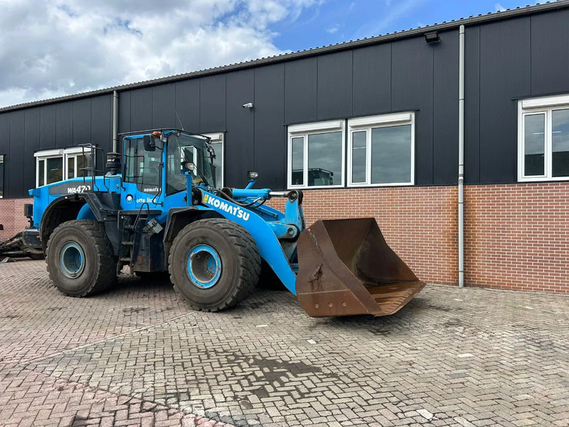 Komatsu WA470-7 - Gumikerekes homlokrakodó: 2 kép. Komatsu WA470-7 - Gumikerekes homlokrakodó: 2 kép.