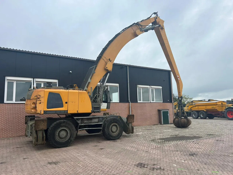 Liebherr LH50M - Hulladék kotró: 4 kép. Liebherr LH50M - Hulladék kotró: 4 kép.