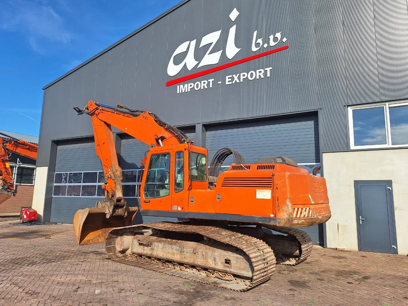 Liebherr R932 - Lánctalpas kotró: 4 kép. Liebherr R932 - Lánctalpas kotró: 4 kép.