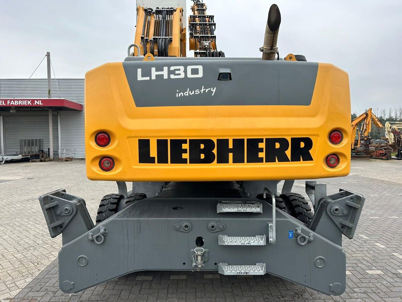 Liebherr LH 30 M - Hulladék kotró: 4 kép. Liebherr LH 30 M - Hulladék kotró: 4 kép.