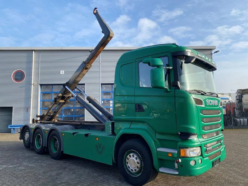 Scania R520 V8 / 8X4 / BIG AXLE / AJK HOOKLIFT 30TON / LIFT+LENKACHSE / NAVI / LEATHER / FULL-AIR / AUTOMATIC / EURO-6 / 2015 - Horgos rakodó teherautó: 2 kép. Scania R520 V8 / 8X4 / BIG AXLE / AJK HOOKLIFT 30TON / LIFT+LENKACHSE / NAVI / LEATHER / FULL-AIR / AUTOMATIC / EURO-6 / 2015 - Horgos rakodó teherautó: 2 kép.