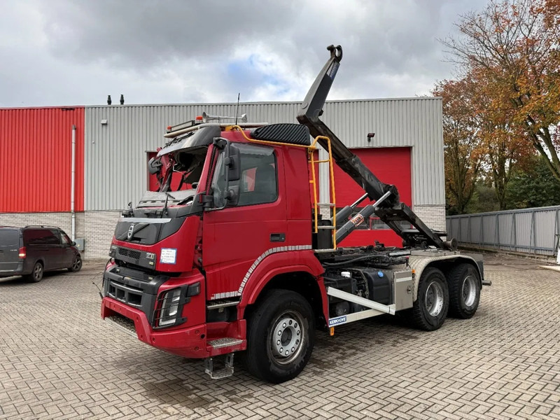 Volvo FMX4-500 / ENGINE RUNNING / VEB+ / 6X4 / BIG AXLE / AJK 20 TON HOOKLIFT / ONLY:276433 KM / AUTOMATIC / EURO-6 / 2020 - Horgos rakodó teherautó: 1 kép. Volvo FMX4-500 / ENGINE RUNNING / VEB+ / 6X4 / BIG AXLE / AJK 20 TON HOOKLIFT / ONLY:276433 KM / AUTOMATIC / EURO-6 / 2020 - Horgos rakodó teherautó: 1 kép.