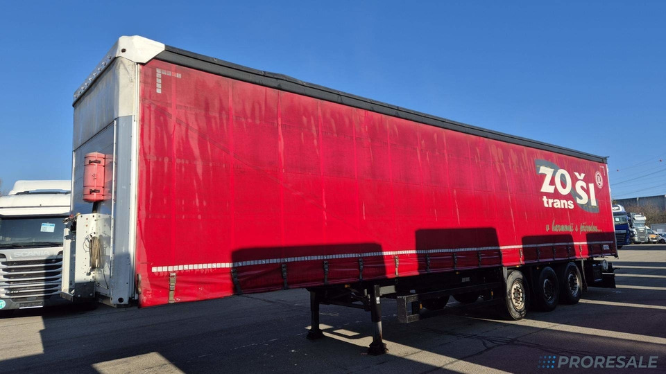 SCHMITZ CARGOBULL SCS 24/L - 13.62 - MULDA na přepravu svitků - Ponyvás félpótkocsi: 2 kép. SCHMITZ CARGOBULL SCS 24/L - 13.62 - MULDA na přepravu svitků - Ponyvás félpótkocsi: 2 kép.