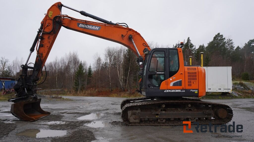 Grävmaskin Doosan DX 235 LCR -5 GPS 3D Moba - Lánctalpas kotró: 1 kép. Grävmaskin Doosan DX 235 LCR -5 GPS 3D Moba - Lánctalpas kotró: 1 kép.