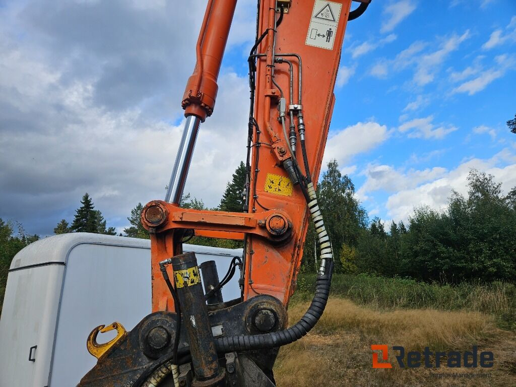 Lánctalpas kotró Grävmaskin Hitachi ZX250LC-3 Tiltrotator: 14 kép.