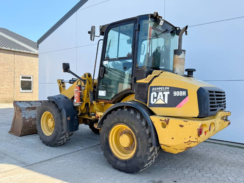 Cat 908H - Quick Coupler / Automatic Greasing - Gumikerekes homlokrakodó: 3 kép. Cat 908H - Quick Coupler / Automatic Greasing - Gumikerekes homlokrakodó: 3 kép.