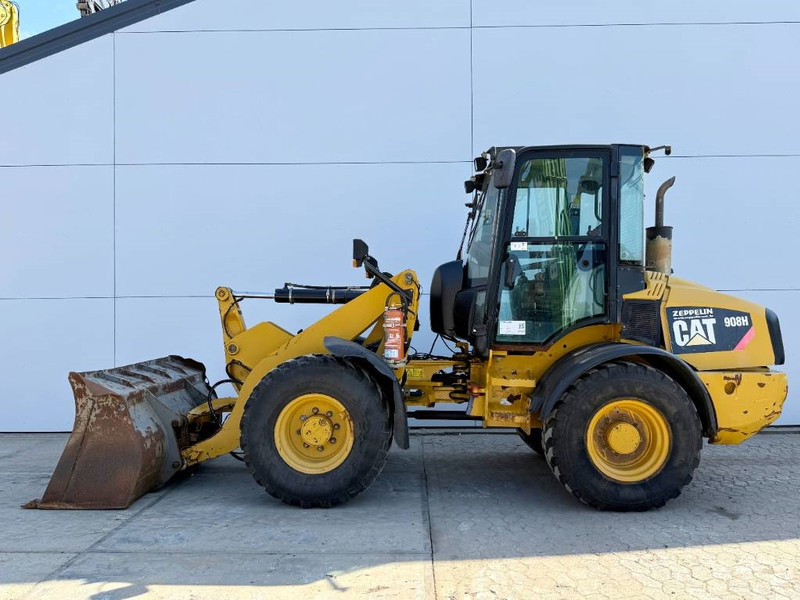 Cat 908H - Quick Coupler / Automatic Greasing - Gumikerekes homlokrakodó: 1 kép. Cat 908H - Quick Coupler / Automatic Greasing - Gumikerekes homlokrakodó: 1 kép.