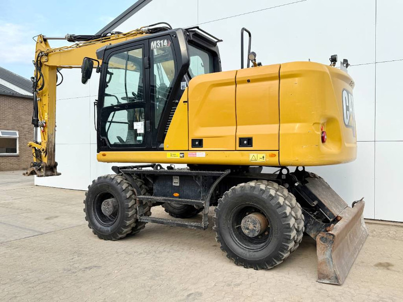 Cat M314 next gen - Triple Boom / Automatic Greasing - Gumikerekes kotró: 3 kép. Cat M314 next gen - Triple Boom / Automatic Greasing - Gumikerekes kotró: 3 kép.