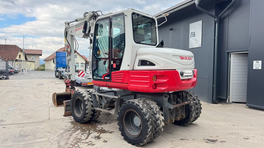 Takeuchi TB295W - 2014 Year - Powertilt - 3X Buckets - Gumikerekes kotró: 3 kép. Takeuchi TB295W - 2014 Year - Powertilt - 3X Buckets - Gumikerekes kotró: 3 kép.