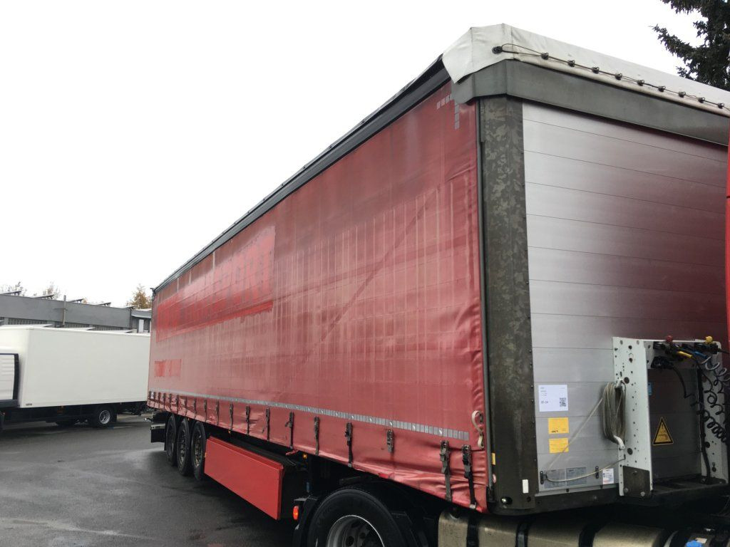 Schmitz Cargobull SCB*S3T standard/lifting roof/Hubdach 2,70-2,85m - Ponyvás félpótkocsi: 1 kép. Schmitz Cargobull SCB*S3T standard/lifting roof/Hubdach 2,70-2,85m - Ponyvás félpótkocsi: 1 kép.