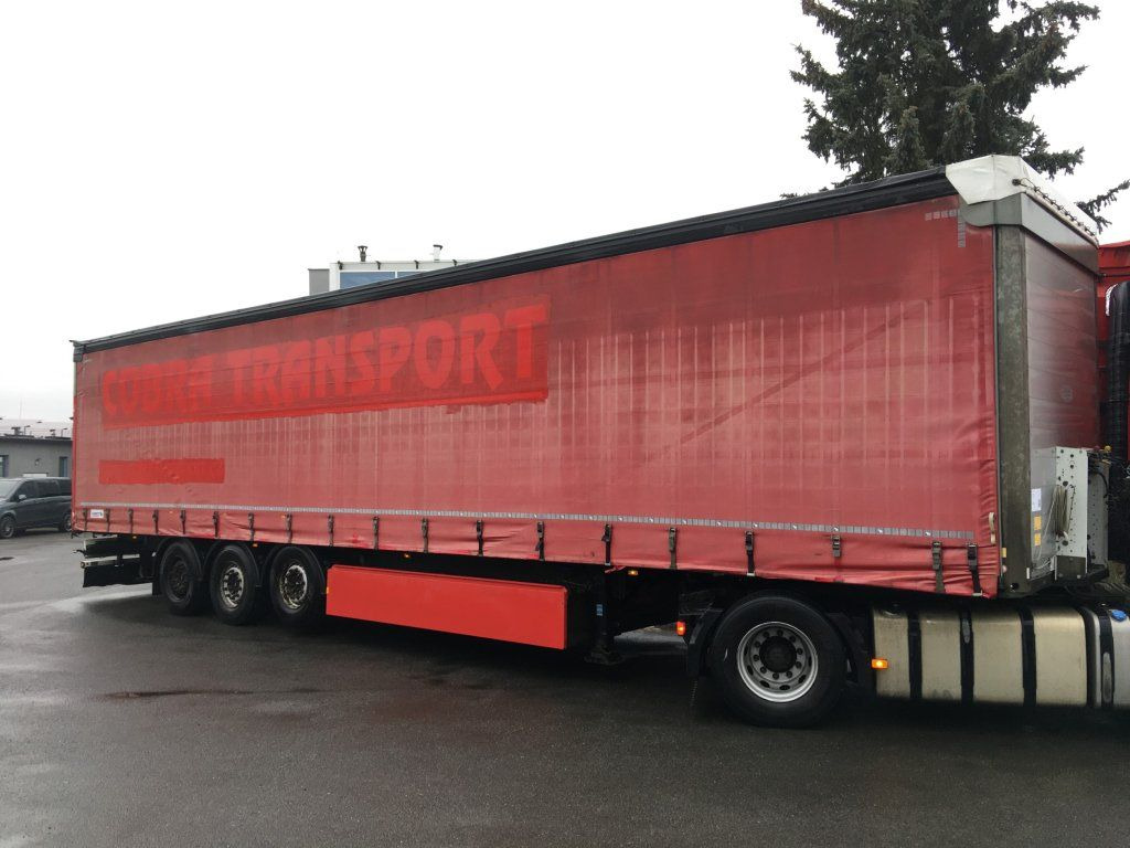 Schmitz Cargobull SCB*S3T standard/lifting roof/Hubdach 2,70-2,85m - Ponyvás félpótkocsi: 2 kép. Schmitz Cargobull SCB*S3T standard/lifting roof/Hubdach 2,70-2,85m - Ponyvás félpótkocsi: 2 kép.