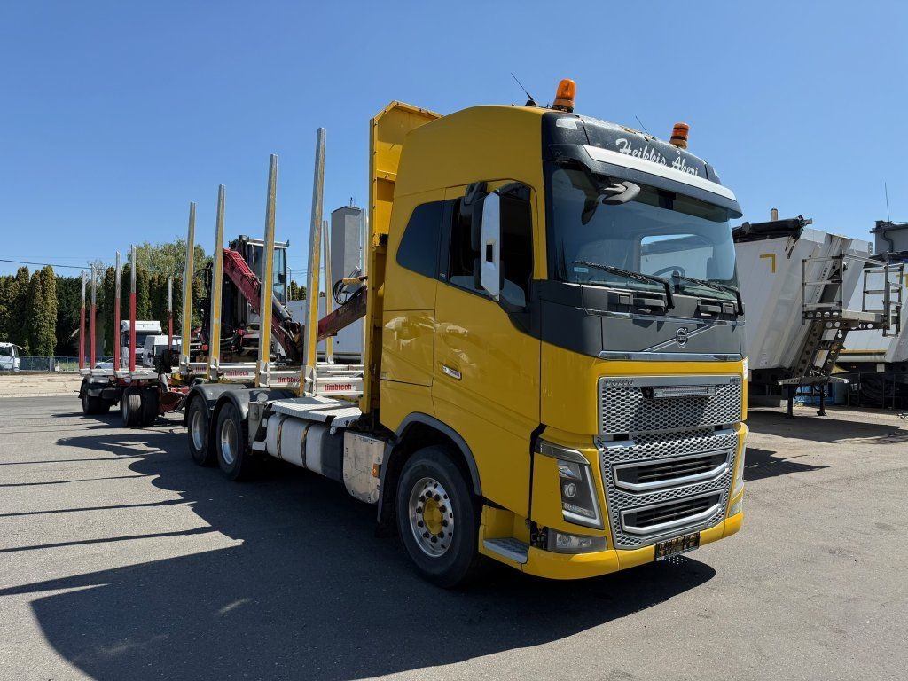 Volvo FH 16 750 6x4 + Fliegl - Rönkszállító teherautó, Darus autó: 2 kép. Volvo FH 16 750 6x4 + Fliegl - Rönkszállító teherautó, Darus autó: 2 kép.