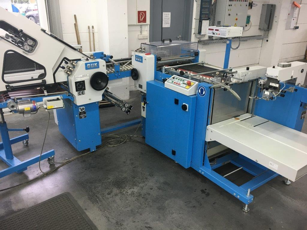 GUK SM 50-2 cutting machine with feeder - Spirálozógép: 1 kép. GUK SM 50-2 cutting machine with feeder - Spirálozógép: 1 kép.