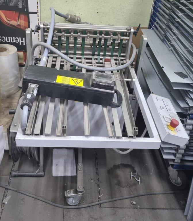 Small sized mobile stack delivery Heidelberg Stahlfolder STA 41 F MKE - Hajtógatógép: 2 kép. Small sized mobile stack delivery Heidelberg Stahlfolder STA 41 F MKE - Hajtógatógép: 2 kép.