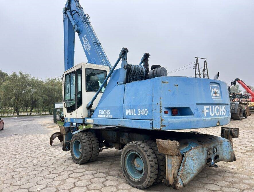 Fuchs MHL340 grab + generator - Hulladék kotró: 3 kép. Fuchs MHL340 grab + generator - Hulladék kotró: 3 kép.