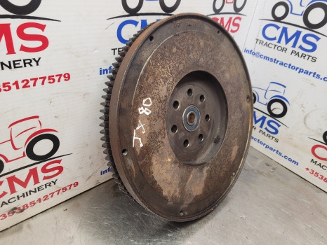 Case Jx80, New Holland Td80 Flywheel 99443278, 84485692, 99443280, 99443281 - Lendkerék: 2 kép. Case Jx80, New Holland Td80 Flywheel 99443278, 84485692, 99443280, 99443281 - Lendkerék: 2 kép.