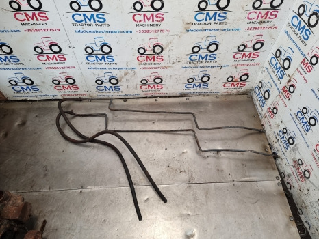 Ford 8340, 7840, 8240, Transmission Oil Cooler Pipes, Tubes 82006300, 82016764 - Radiátor: 2 kép. Ford 8340, 7840, 8240, Transmission Oil Cooler Pipes, Tubes 82006300, 82016764 - Radiátor: 2 kép.