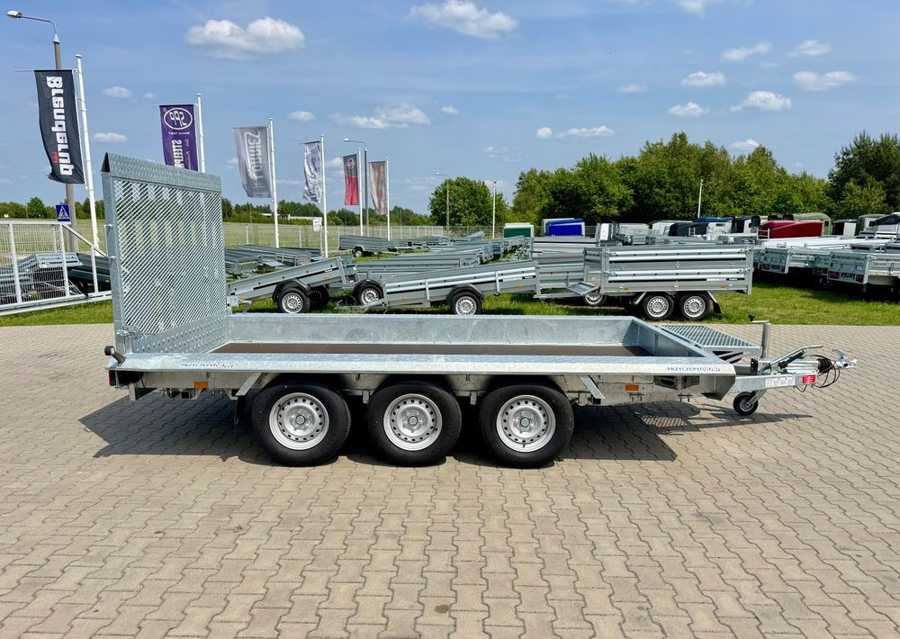 NIEWIADÓW Niewiadów KN401835T - 400 x 185 cm | 2570kg ładowności | trap stalowy | 3-osiowa budowlanka - Gépszállító utánfutó: 2 kép. NIEWIADÓW Niewiadów KN401835T - 400 x 185 cm | 2570kg ładowności | trap stalowy | 3-osiowa budowlanka - Gépszállító utánfutó: 2 kép.