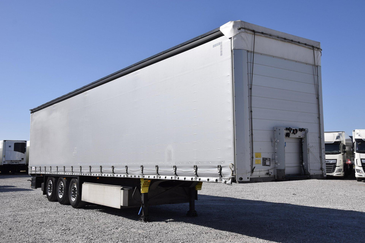 Schmitz Cargobull SCS24/L Lifting Axle - Ponyvás félpótkocsi: 3 kép. Schmitz Cargobull SCS24/L Lifting Axle - Ponyvás félpótkocsi: 3 kép.