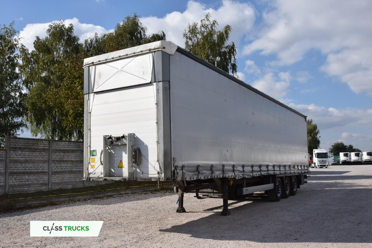 Schmitz Cargobull SCS24/L Varios - Ponyvás félpótkocsi: 1 kép. Schmitz Cargobull SCS24/L Varios - Ponyvás félpótkocsi: 1 kép.