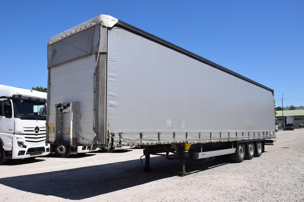 Schmitz Cargobull SCS24/L Varios - Ponyvás félpótkocsi: 1 kép. Schmitz Cargobull SCS24/L Varios - Ponyvás félpótkocsi: 1 kép.