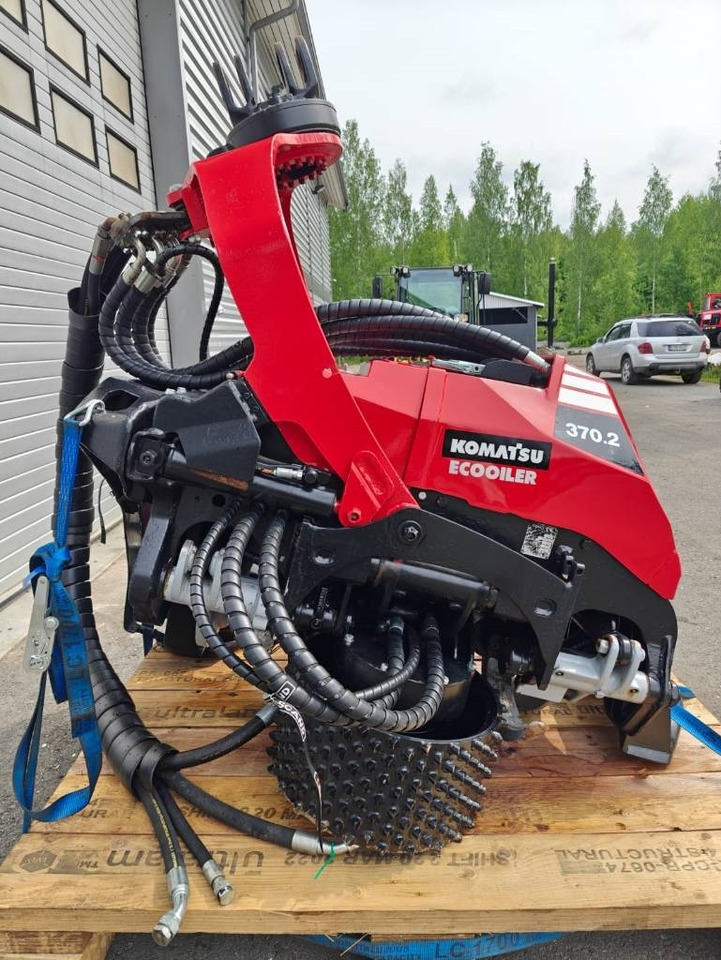 Komatsu 370.2 - Erdészeti fej: 2 kép. Komatsu 370.2 - Erdészeti fej: 2 kép.
