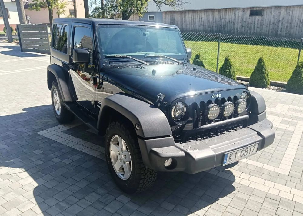 Jeep Wrangler 2.8 CRD Sport - Kabrió: 1 kép. Jeep Wrangler 2.8 CRD Sport - Kabrió: 1 kép.