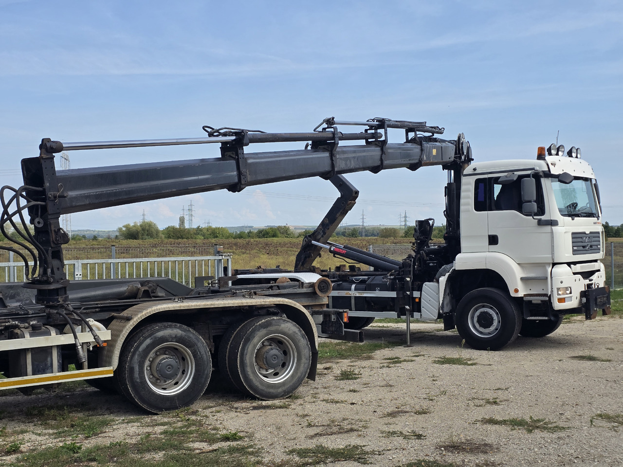 MAN TGA 26.440 6X6 / HOOK SYSTEM / HIAB 166D REMOTE SPECIAL PRICE ONLY THIS YEAR - Horgos rakodó teherautó, Darus autó: 4 kép. MAN TGA 26.440 6X6 / HOOK SYSTEM / HIAB 166D REMOTE SPECIAL PRICE ONLY THIS YEAR - Horgos rakodó teherautó, Darus autó: 4 kép.