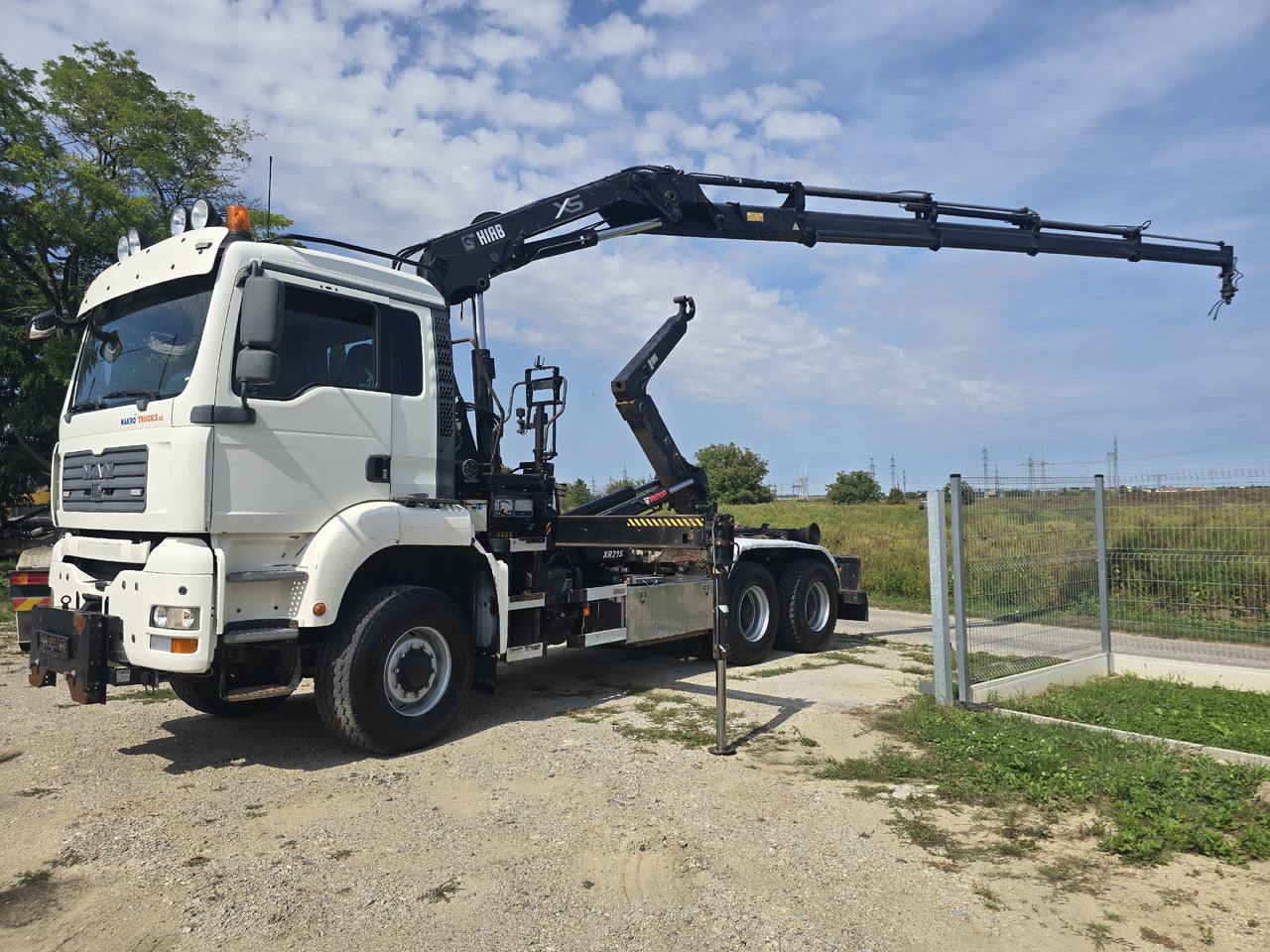 MAN TGA 26.440 6X6 / HOOK SYSTEM / HIAB 166D REMOTE - Horgos rakodó teherautó, Darus autó: 3 kép. MAN TGA 26.440 6X6 / HOOK SYSTEM / HIAB 166D REMOTE - Horgos rakodó teherautó, Darus autó: 3 kép.