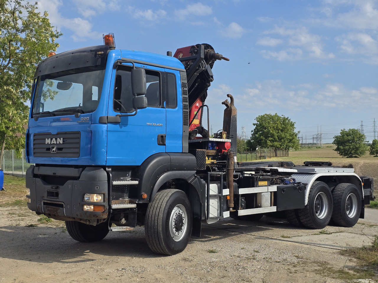 MAN TGA 33.430 6X6 / HMF 1823 K3+REM.CON./ HOOK SYSTEM - Horgos rakodó teherautó, Darus autó: 3 kép. MAN TGA 33.430 6X6 / HMF 1823 K3+REM.CON./ HOOK SYSTEM - Horgos rakodó teherautó, Darus autó: 3 kép.