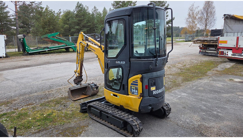 Komatsu PC14R - Minikotró: 4 kép. Komatsu PC14R - Minikotró: 4 kép.