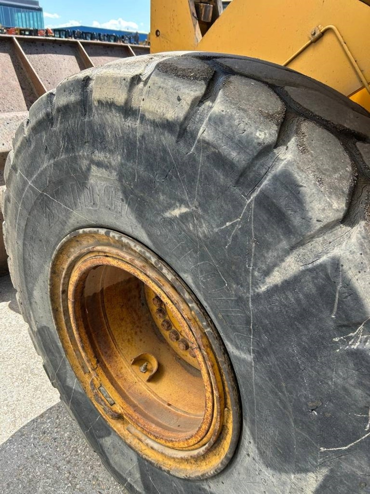 Gumikerekes homlokrakodó CAT 950 K: 26 kép.