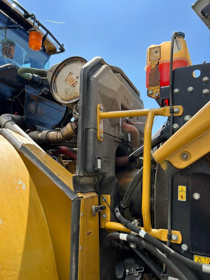 Gumikerekes homlokrakodó CAT 950 K: 18 kép.