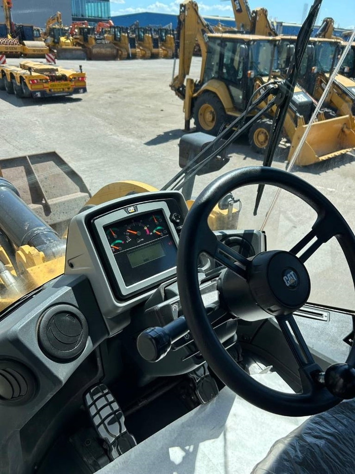 Gumikerekes homlokrakodó CAT 950 K: 12 kép.