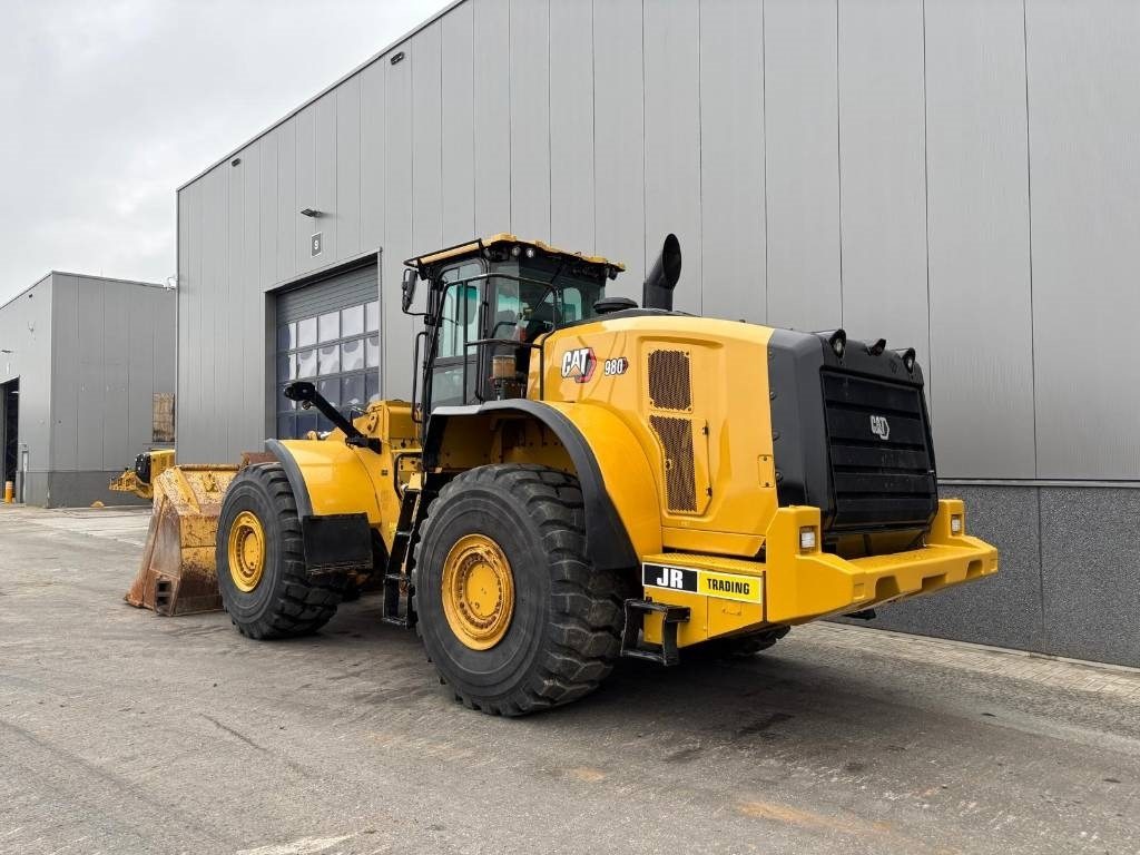 CAT 980  - Gumikerekes homlokrakodó: 3 kép. CAT 980  - Gumikerekes homlokrakodó: 3 kép.