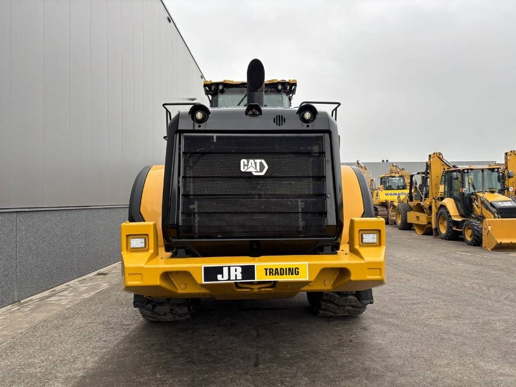 CAT 980 - Gumikerekes homlokrakodó: 4 kép. CAT 980 - Gumikerekes homlokrakodó: 4 kép.