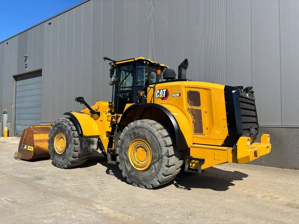 CAT 980 M - Gumikerekes homlokrakodó: 3 kép. CAT 980 M - Gumikerekes homlokrakodó: 3 kép.