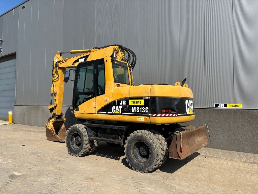 CAT M 313 C (Low verified hours) - Gumikerekes kotró: 3 kép. CAT M 313 C (Low verified hours) - Gumikerekes kotró: 3 kép.